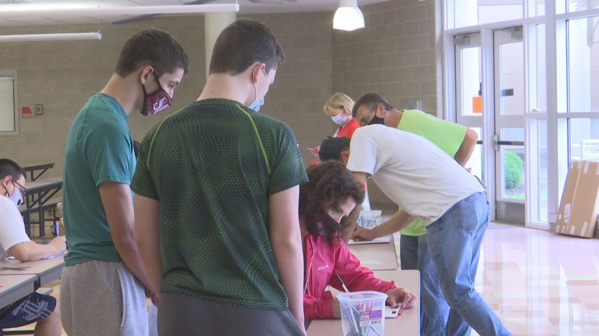 Families filling out forms